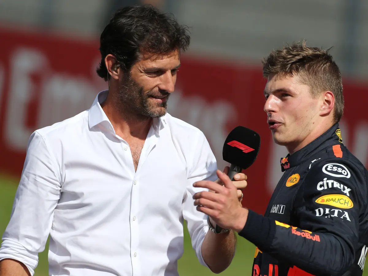 Former Red Bull F1 driver Mark Webber talks to current Red Bull ace Max Verstappen