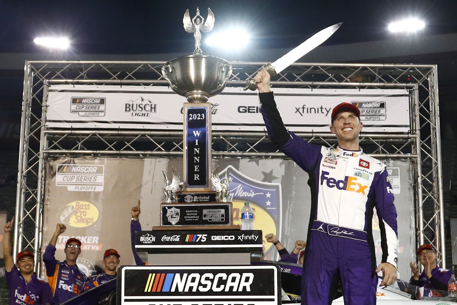 Denny Hamlin, driver of the #11 FedEx Freight Direct Toyota, celebrates in victory lane after winning the NASCAR Cup Series Bass Pro Shops Night Race at Bristol Motor Speedway on September 16, 2023 in Bristol, Tennessee. (Photo by Jared C. Tilton/Getty Images)