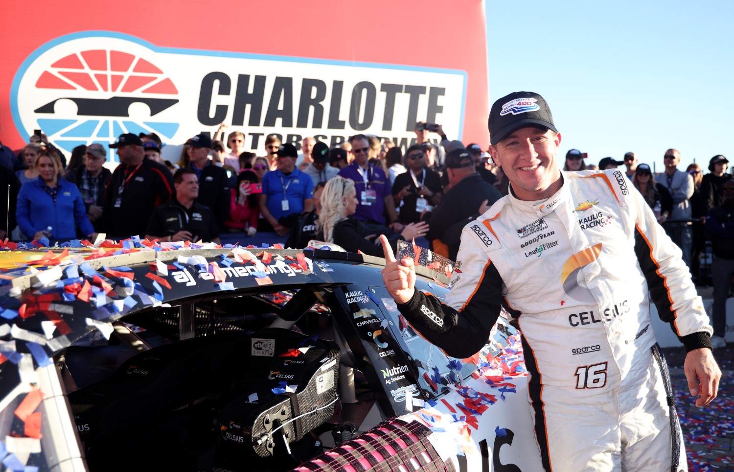 AJ Allmendinger, driver of the #16 Celsius Chevrolet, poses next to his winner sticker in victory lane after winning the NASCAR Cup Series Bank of America ROVAL 400 at Charlotte Motor Speedway on October 08, 2023 in Concord, North Carolina. (Photo by Jared C. Tilton/Getty Images)