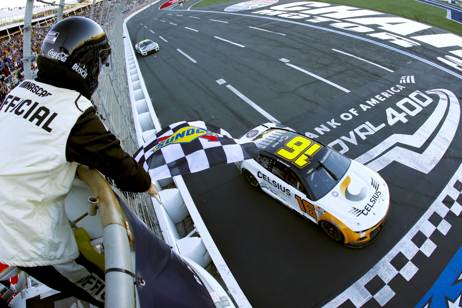 AJ Allmendinger, driver of the #16 Celsius Chevrolet, takes the checkered flag to win the NASCAR Cup Series Bank of America ROVAL 400 at Charlotte Motor Speedway on October 08, 2023 in Concord, North Carolina. (Photo by James Gilbert/Getty Images)