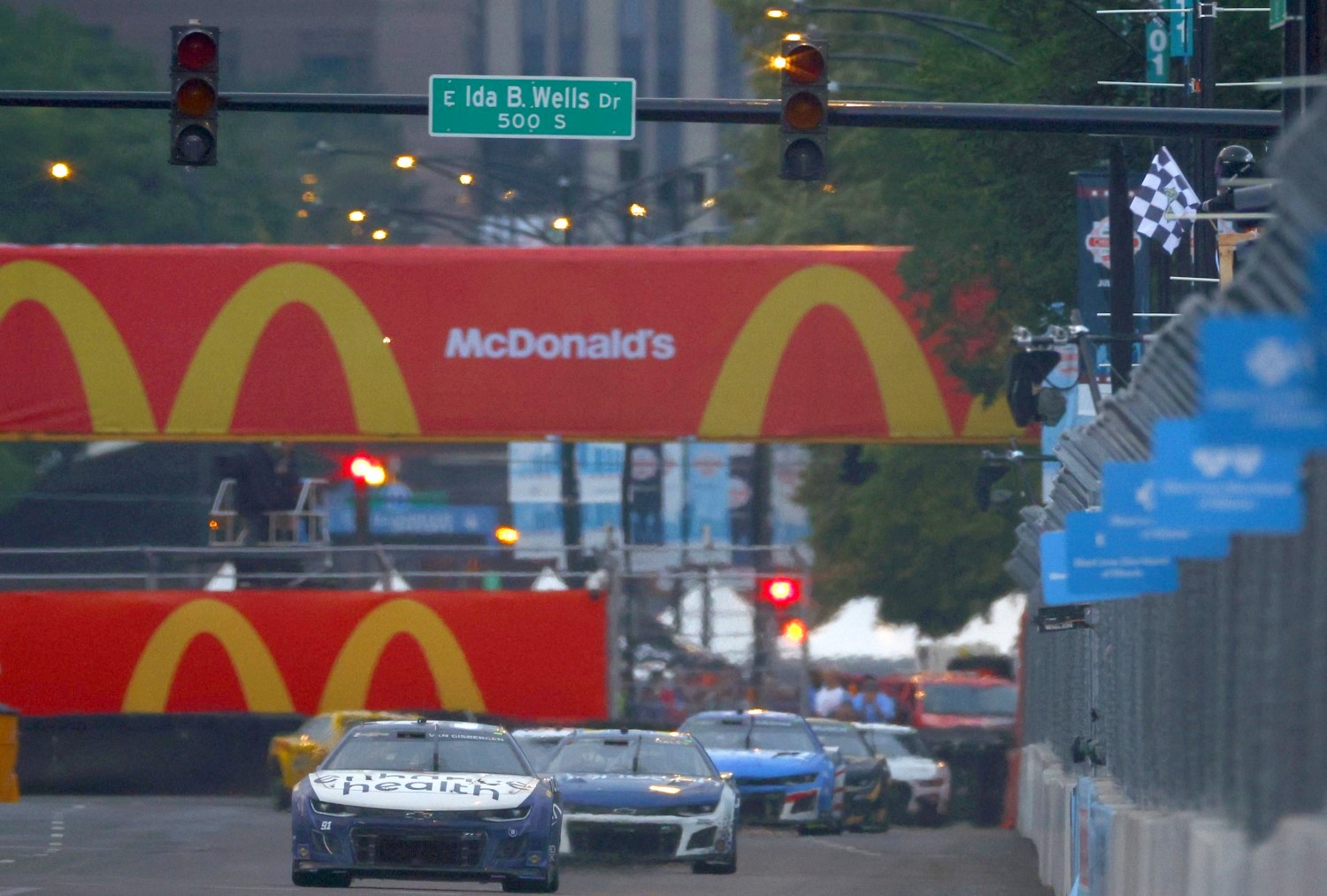 Shane Van Gisbergen, driver of the #91 Enhance Health Chevrolet, takes the checkered flag to win the NASCAR Cup Series Grant Park 220 at the Chicago Street Course on July 02, 2023 in Chicago, Illinois. (Photo by Jared C. Tilton/Getty Images)