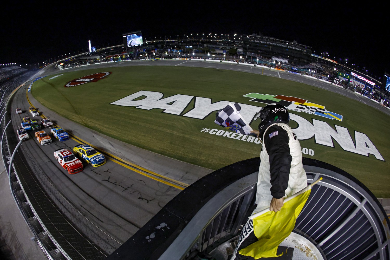 Justin Allgaier, driver of the #7 Hellmann's Chevrolet, takes the checkered flag to win the NASCAR Xfinity Series Wawa 250 powered by Coca-Cola at Daytona International Speedway on August 25, 2023 in Daytona Beach, Florida. (Photo by James Gilbert/Getty Images)