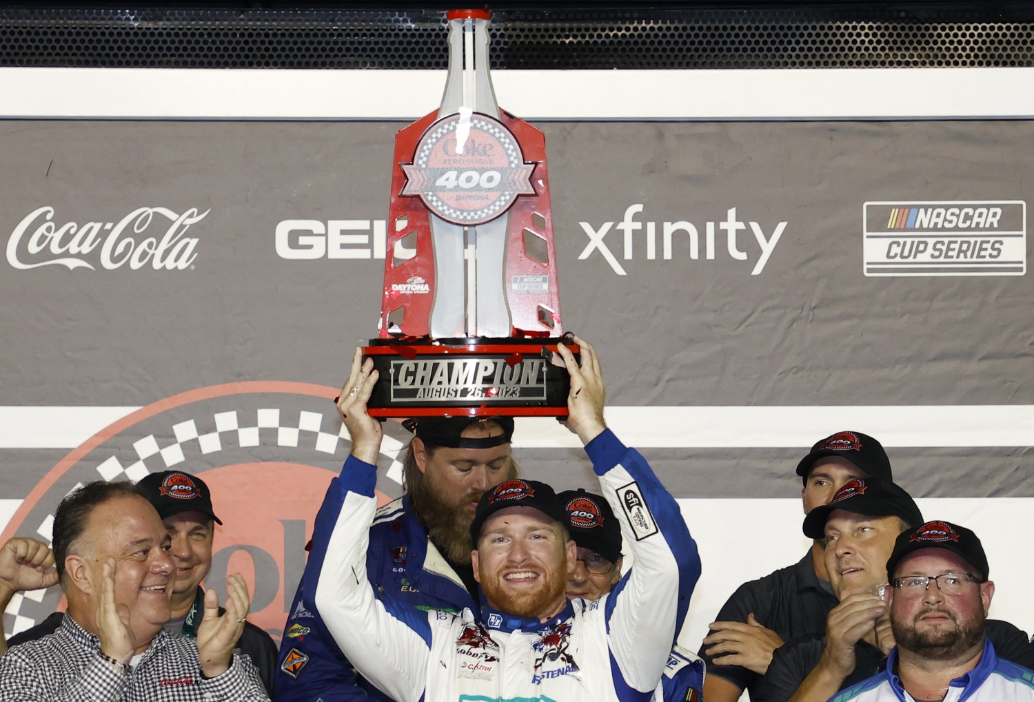 Chris Buescher, driver of the #17 Fifth Third Bank Ford, celebrates in victory lane after winning the NASCAR Cup Series Coke Zero Sugar 400 at Daytona International Speedway on August 26, 2023 in Daytona Beach, Florida. (Photo by Chris Graythen/Getty Images)