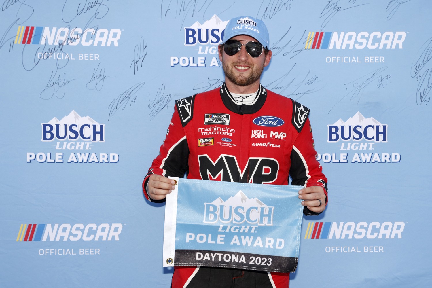 Chase Briscoe, driver of the #14 Magical Vacation Planner Ford, poses for photos after winning the pole award during qualifying for the NASCAR Cup Series Coke Zero Sugar 400 at Daytona International Speedway on August 25, 2023 in Daytona Beach, Florida. (Photo by Chris Graythen/Getty Images)