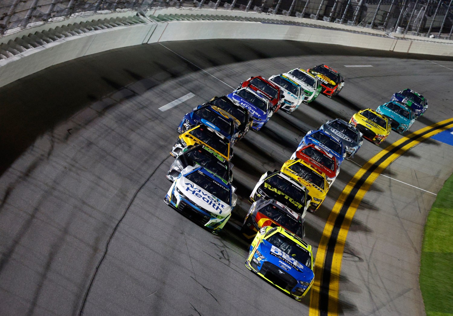 Ryan Blaney, driver of the #12 Menards/Blue DEF/PEAK Ford, and Ross Chastain, driver of the #1 AdventHealth Chevrolet, lead the field during the NASCAR Cup Series Bluegreen Vacations Duel #1 at Daytona International Speedway on February 16, 2023 in Daytona Beach, Florida. (Photo by Sean Gardner/Getty Images)