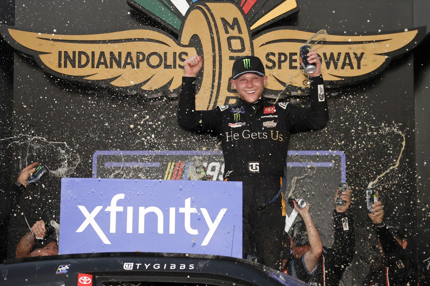 Ty Gibbs, driver of the #19 He Gets Us Toyota, celebrates in victory lane after winning the NASCAR Xfinity Series Pennzoil 150 at the Brickyard at Indianapolis Motor Speedway on August 12, 2023 in Indianapolis, Indiana. (Photo by Sean Gardner/Getty Images)