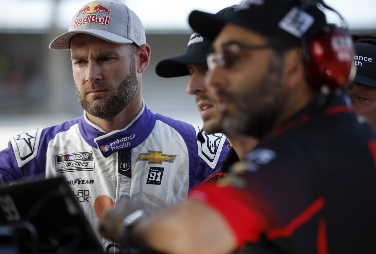 INDIANAPOLIS, INDIANA - AUGUST 12: Shane Van Gisbergen, driver of the #91 Enhance Health Chevrolet, and crew work the garage area during practice for the NASCAR Cup Series Verizon 200 at the Brickyard at Indianapolis Motor Speedway on August 12, 2023 in Indianapolis, Indiana. (Photo by Sean Gardner/Getty Images)