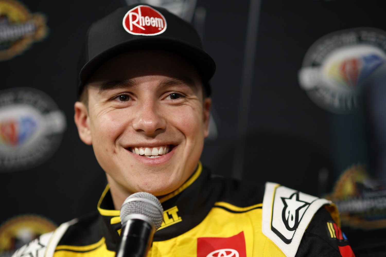 Christopher Bell, driver of the #20 DEWALT Toyota, speaks to the media during the NASCAR Championship Media Day at Phoenix Raceway on November 02, 2023 in Avondale, Arizona. (Photo by Sean Gardner/Getty Images)