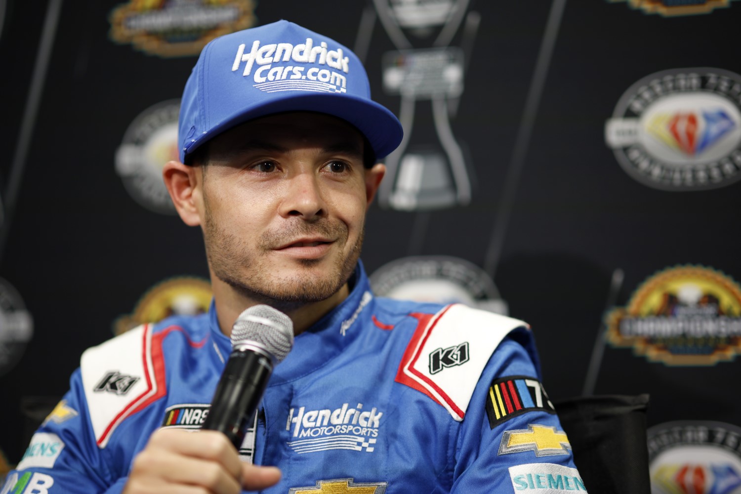 Kyle Larson, driver of the #5 HendrickCars.com Chevrolet, speaks to the media during the NASCAR Championship Media Day at Phoenix Raceway on November 02, 2023 in Avondale, Arizona. (Photo by Sean Gardner/Getty Images)
