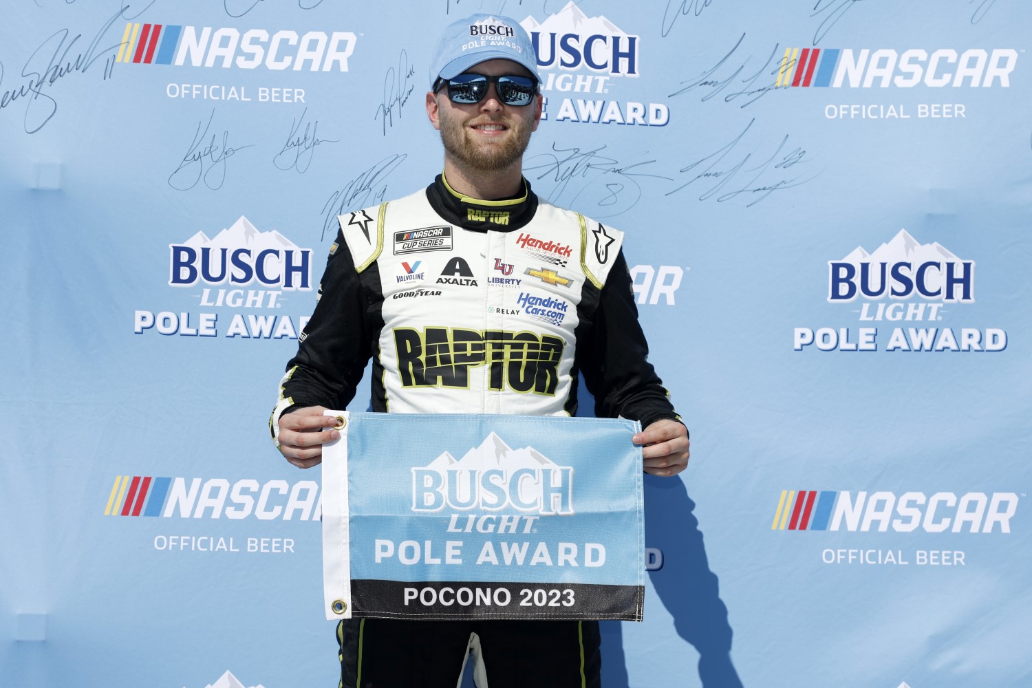 William Byron, driver of the #24 RaptorTough.com Chevrolet, poses for photos after winning the pole award during qualifying for the NASCAR Cup Series HighPoint.com 400 at Pocono Raceway on July 22, 2023 in Long Pond, Pennsylvania. (Photo by Sean Gardner/Getty Images)