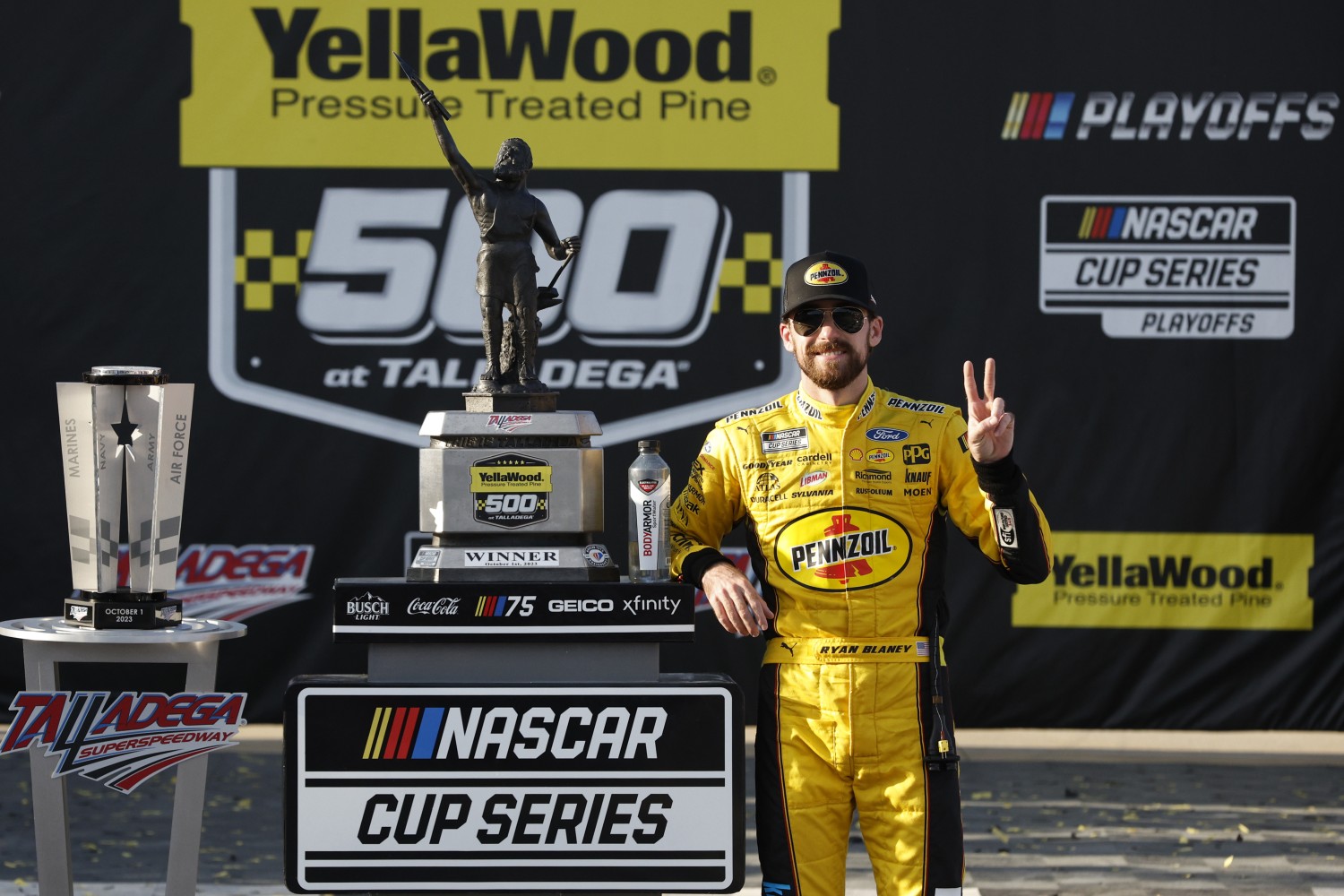 Ryan Blaney, driver of the #12 Menards/Pennzoil Ford, celebrates in victory lane after winning the NASCAR Cup Series YellaWood 500 at Talladega Superspeedway on October 01, 2023 in Talladega, Alabama. (Photo by Sean Gardner/Getty Images)