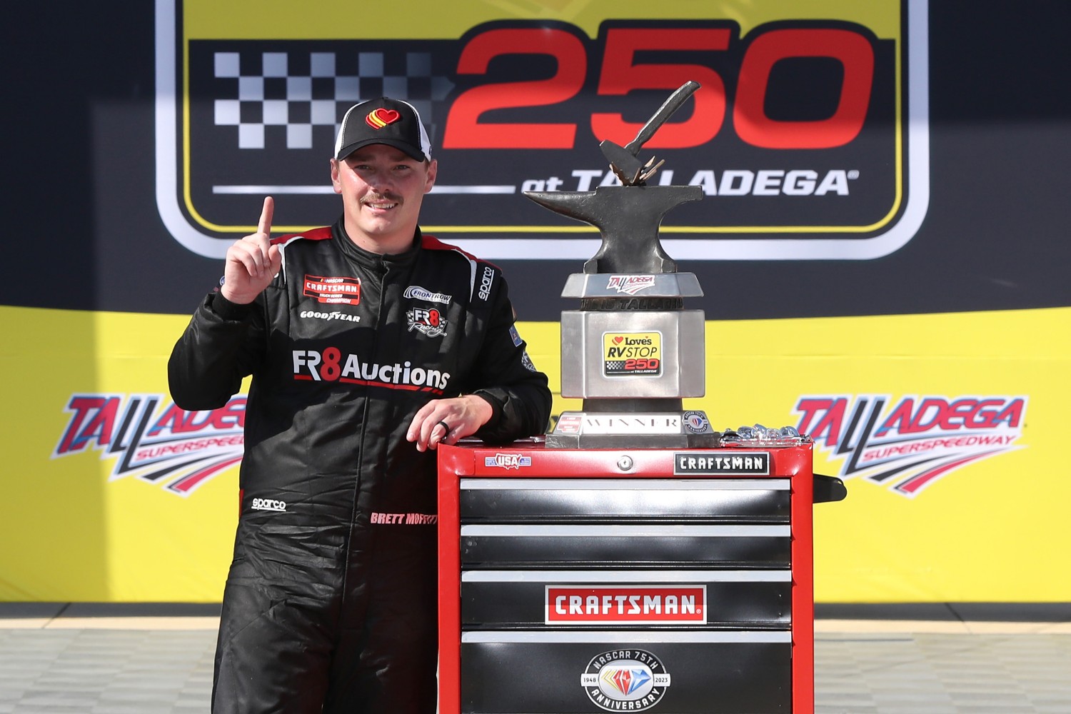 Brett Moffitt, driver of the #34 Fr8Auctions Ford, celebrates in victory lane after winning the NASCAR Craftsman Truck Series Love's RV Stop 250 at Talladega Superspeedway on September 30, 2023 in Talladega, Alabama. (Photo by Meg Oliphant/Getty Images)