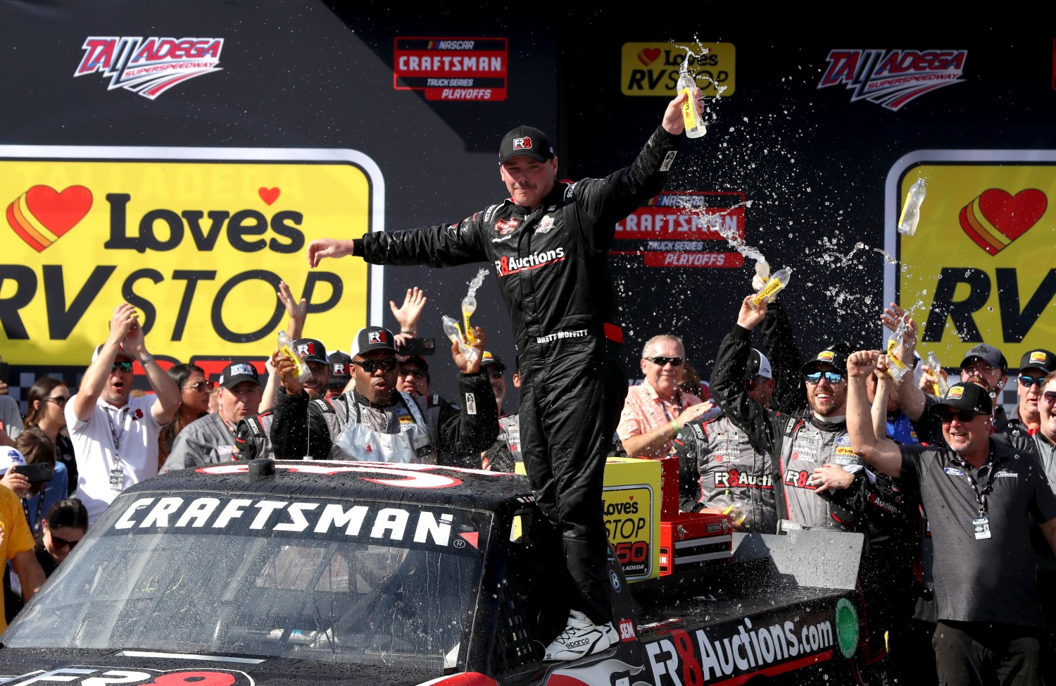 Brett Moffitt, driver of the #34 Fr8Auctions Ford, celebrates in victory lane after winning the NASCAR Craftsman Truck Series Love's RV Stop 250 at Talladega Superspeedway on September 30, 2023 in Talladega, Alabama. (Photo by Meg Oliphant/Getty Images)