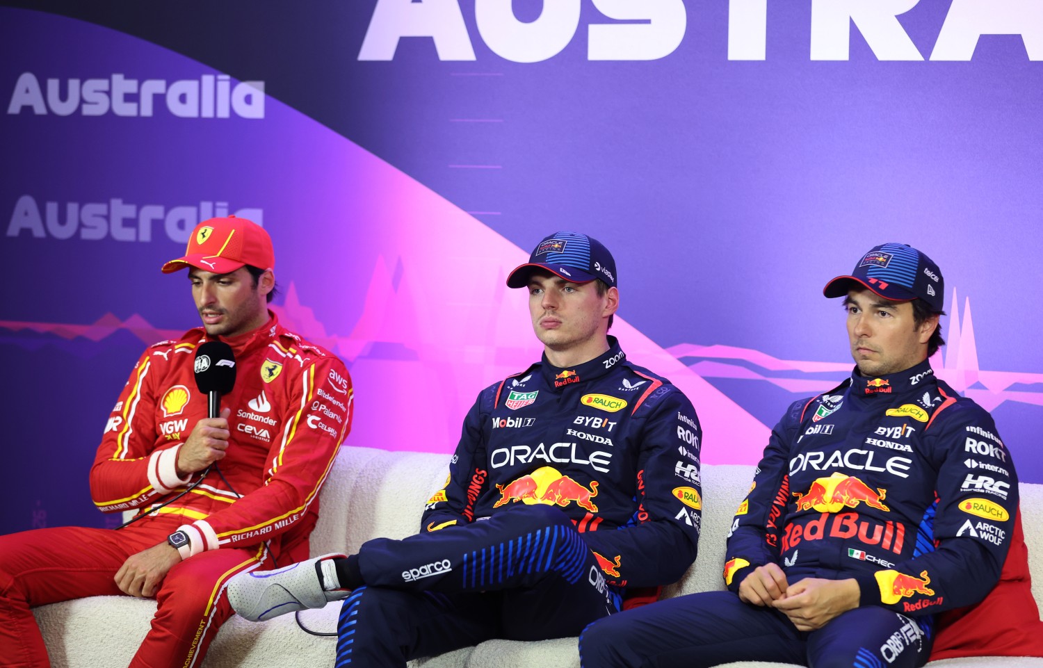 Pole position qualifier Max Verstappen of the Netherlands and Oracle Red Bull Racing (C), Second placed qualifier Carlos Sainz of Spain and Ferrari (L) and Third placed qualifier Sergio Perez of Mexico and Oracle Red Bull Racing (R) attend the press conference after qualifying ahead of the F1 Grand Prix of Australia at Albert Park Circuit on March 23, 2024 in Melbourne, Australia. (Photo by Robert Cianflone/Getty Images for Red Bull)