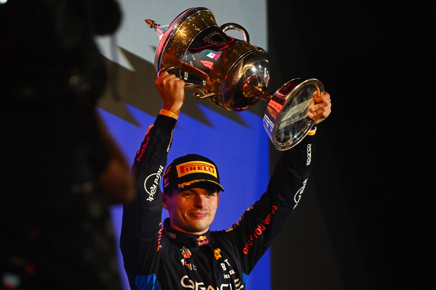 Race winner Max Verstappen of the Netherlands and Oracle Red Bull Racing celebrates on the podium during the F1 Grand Prix of Bahrain at Bahrain International Circuit on March 02, 2024 in Bahrain, Bahrain. (Photo by Clive Mason/Getty Images) // Getty Images / Red Bull Content Pool