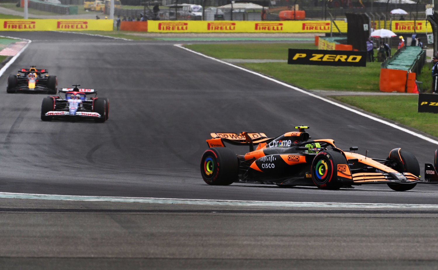 Lando Norris, McLaren MCL38, leads Valtteri Bottas, Kick Sauber F1 Team C44, Daniel Ricciardo, VCARB 01, and Max Verstappen, Red Bull Racing RB20 during the Chinese GP at Shanghai International Circuit on Friday April 19, 2024 in Shanghai, China. (Photo by Mark Sutton / LAT Images for Pirelli)
