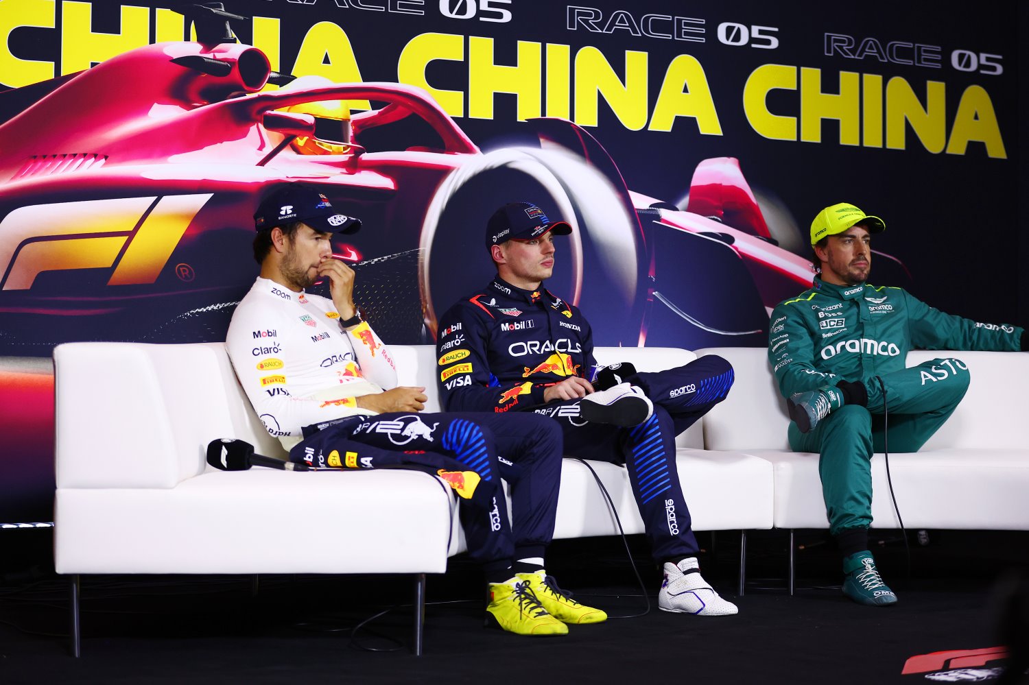 Pole position qualifier Max Verstappen of the Netherlands and Oracle Red Bull Racing, Second placed qualifier Sergio Perez of Mexico and Oracle Red Bull Racing and Third placed qualifier Fernando Alonso of Spain and Aston Martin F1 Team attend the press conference after qualifying ahead of the F1 Grand Prix of China at Shanghai International Circuit on April 20, 2024 in Shanghai, China. (Photo by Bryn Lennon/Getty Images) // Getty Images / Red Bull Content Pool