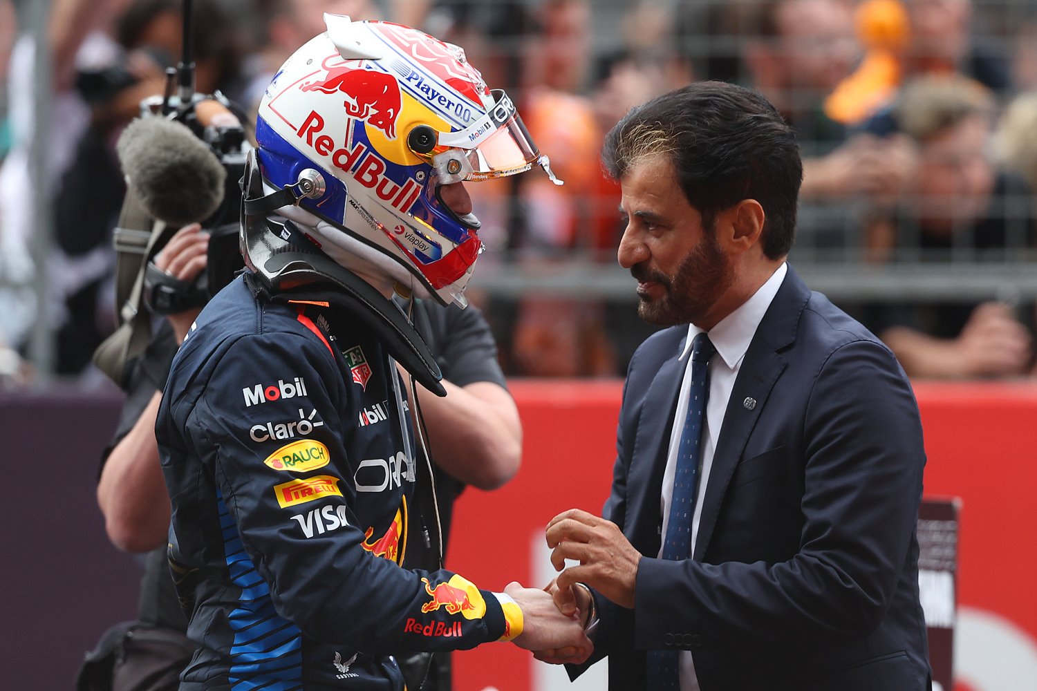 Mohammed ben Sulayem, FIA President congratulates Race winner Max Verstappen of the Netherlands and Oracle Red Bull Racing in parc ferme after the F1 Grand Prix of China at Shanghai International Circuit on April 21, 2024 in Shanghai, China. (Photo by Lintao Zhang/Getty Images ) // Getty Images / Red Bull Content Pool