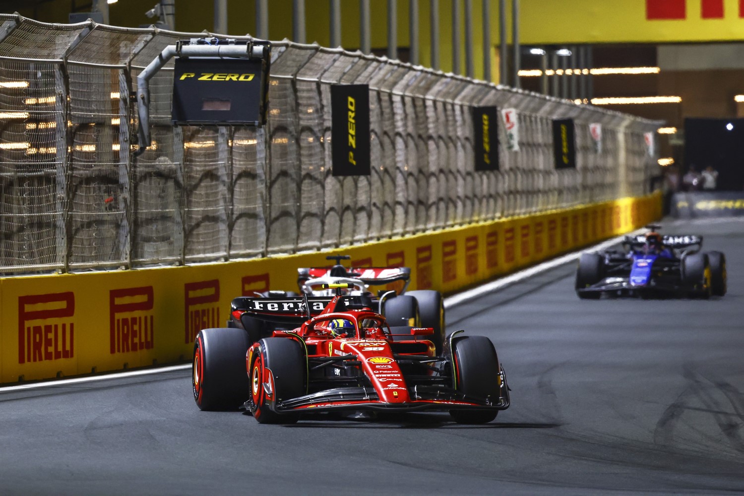 Oliver Bearman, Ferrari SF-24, leads Kevin Magnussen, Haas VF-24, and Alex Albon, Williams FW46 during the Saudi Arabian GP at Jeddah Street Circuit on Saturday March 09, 2024 in Jeddah, Saudi Arabia. (Photo by Sam Bloxham / LAT Images for Pirelli)