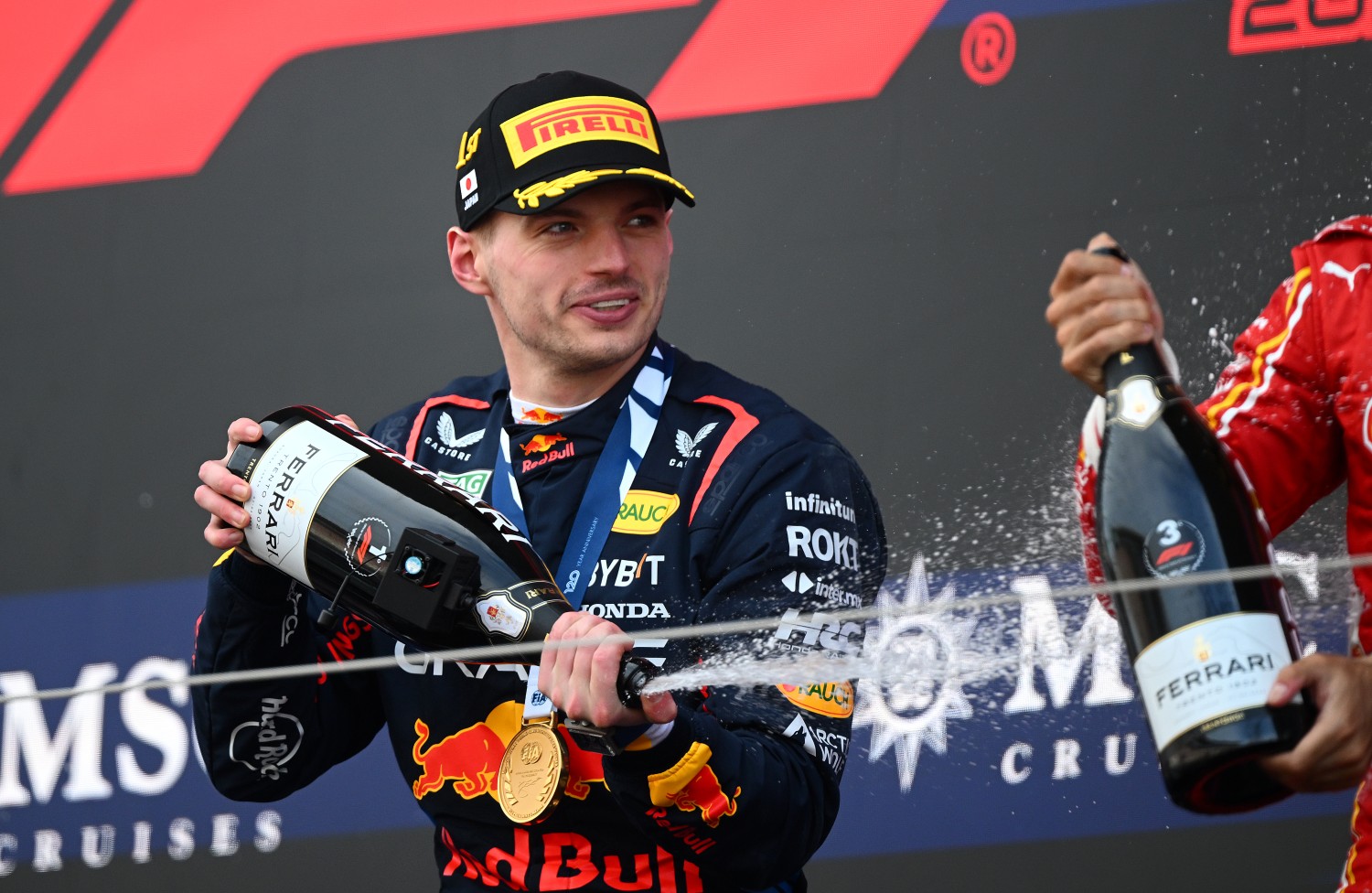 Race winner Max Verstappen of the Netherlands and Oracle Red Bull Racing celebrates on the podium during the F1 Grand Prix of Japan at Suzuka International Racing Course on April 07, 2024 in Suzuka, Japan. (Photo by Clive Mason/Getty Images)