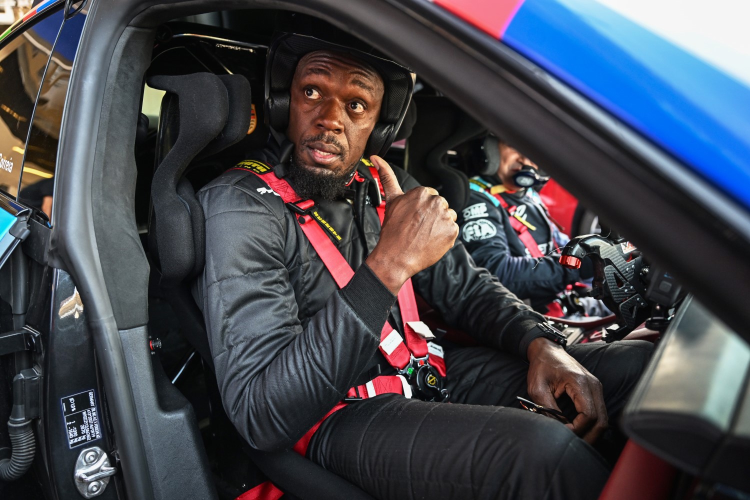 Usain Bolt in the Porsche Taycan Safety Car with Bruno Correia, Safety Car Driver, FIA