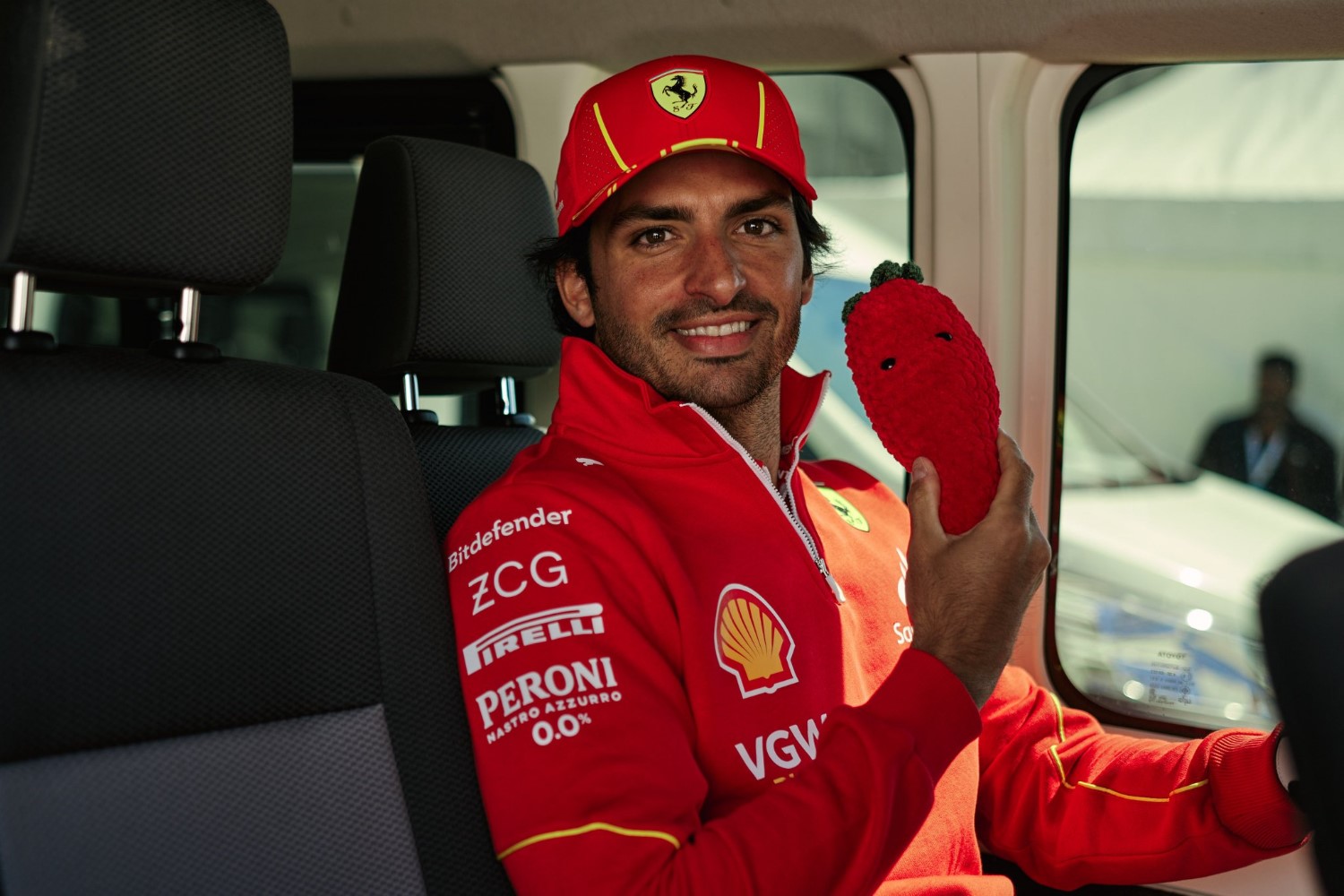 #55 Ferrari F1 driver Carlos Sainz Jr. looks happy