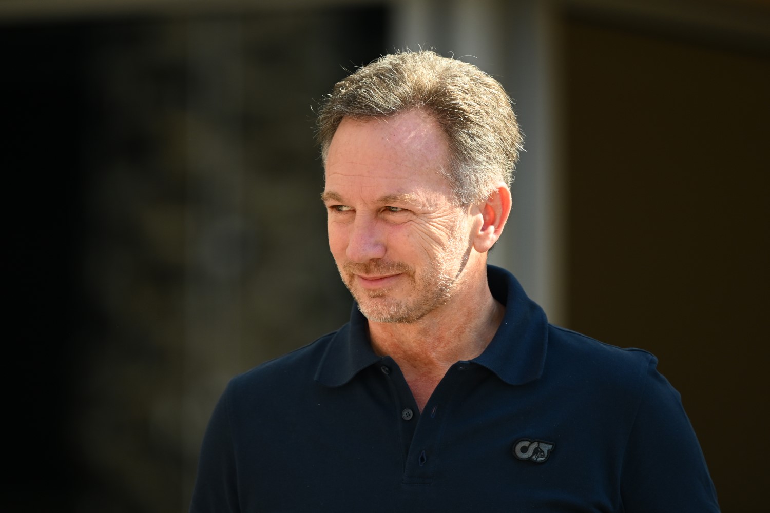 Red Bull Racing Team Principal Christian Horner looks on in the Paddock during day one of F1 Testing at Bahrain International Circuit on February 21, 2024 in Bahrain, Bahrain. (Photo by Clive Mason/Getty Images) // Getty Images / Red Bull Content Pool