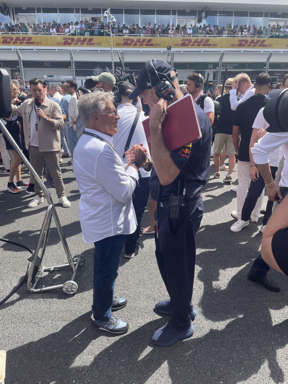 Mario Andretti talks to Adrian Newey on the Miami GP grid - might they be talking a job!