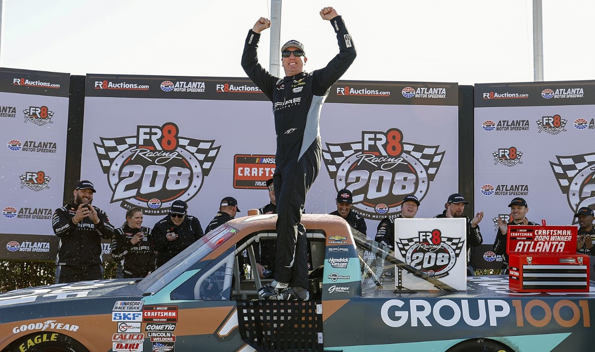 Kyle Busch, driver of the #7 Group 1001 Chevrolet, celebrates in victory lane after winning the NASCAR Craftsman Truck Series Fr8 208 at Atlanta Motor Speedway on February 24, 2024 in Hampton, Georgia. (Photo by Todd Kirkland/Getty Images)