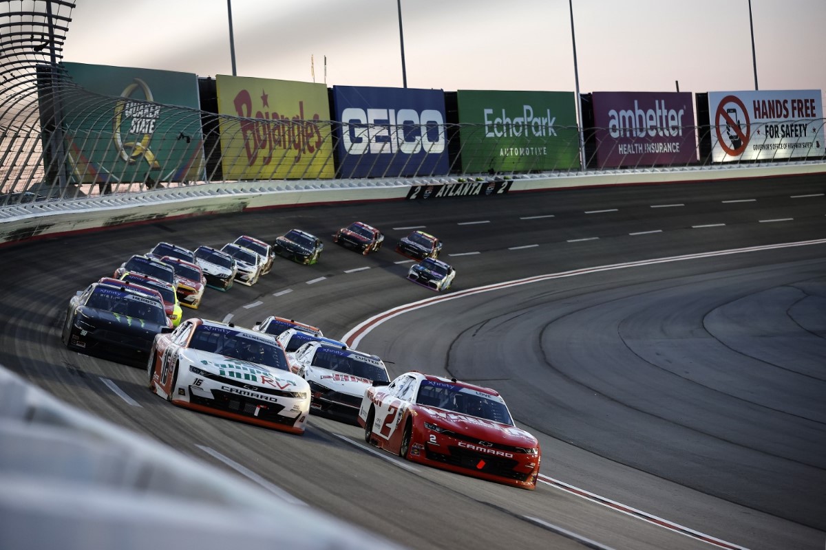 esse Love, driver of the #2 Whelen Chevrolet, and AJ Allmendinger, driver of the #16 Campers Inn RV Chevrolet, lead the field during the NASCAR Xfinity Series King of Tough 250 at Atlanta Motor Speedway on February 24, 2024 in Hampton, Georgia. (Photo by Alex Slitz/Getty Images)