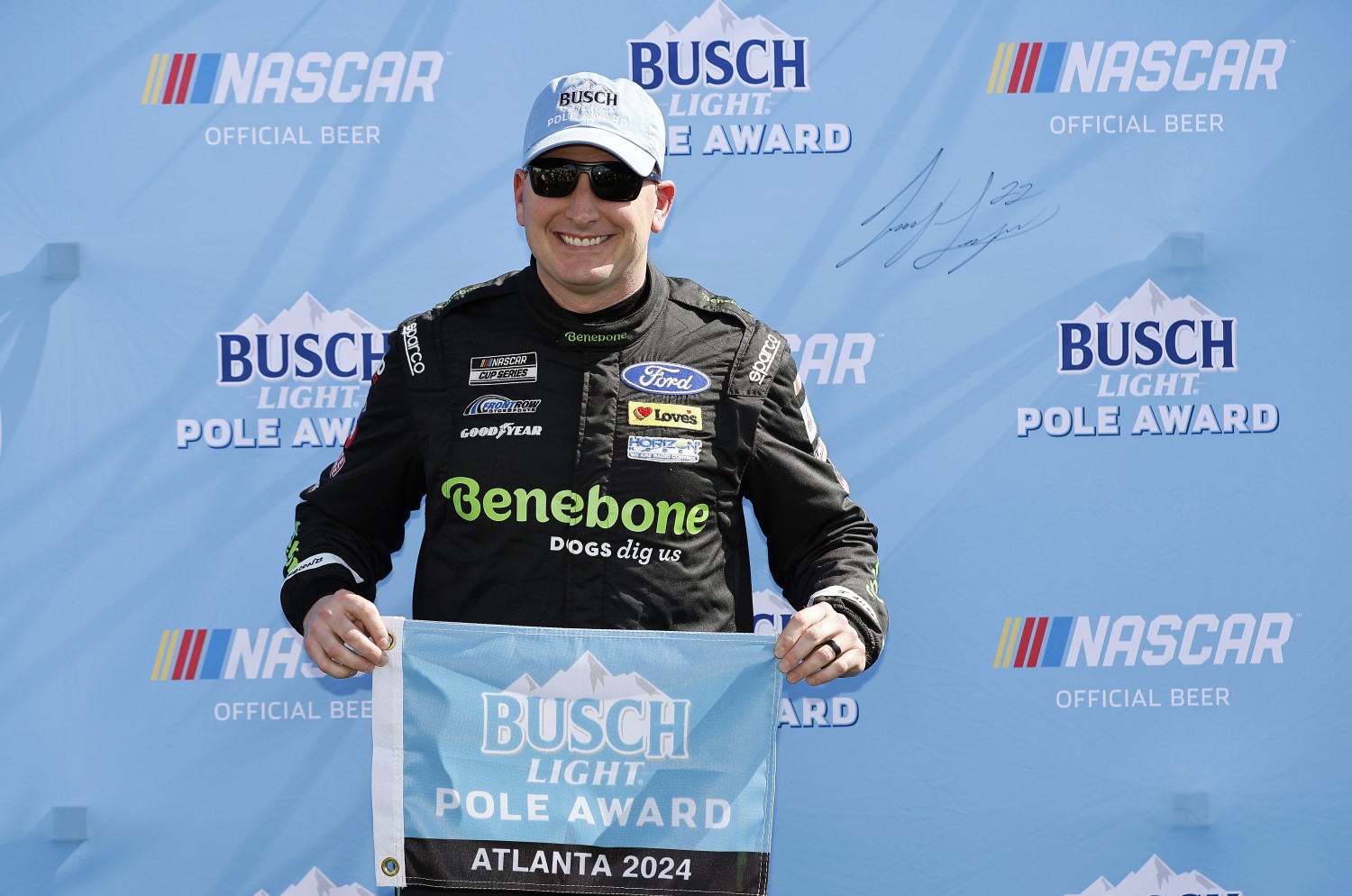 Michael McDowell, driver of the #34 Benebone Ford, poses for photos after winning the pole award during qualifying for the NASCAR Cup Series Ambetter Health 400 at Atlanta Motor Speedway on February 24, 2024 in Hampton, Georgia. (Photo by Alex Slitz/Getty Images)