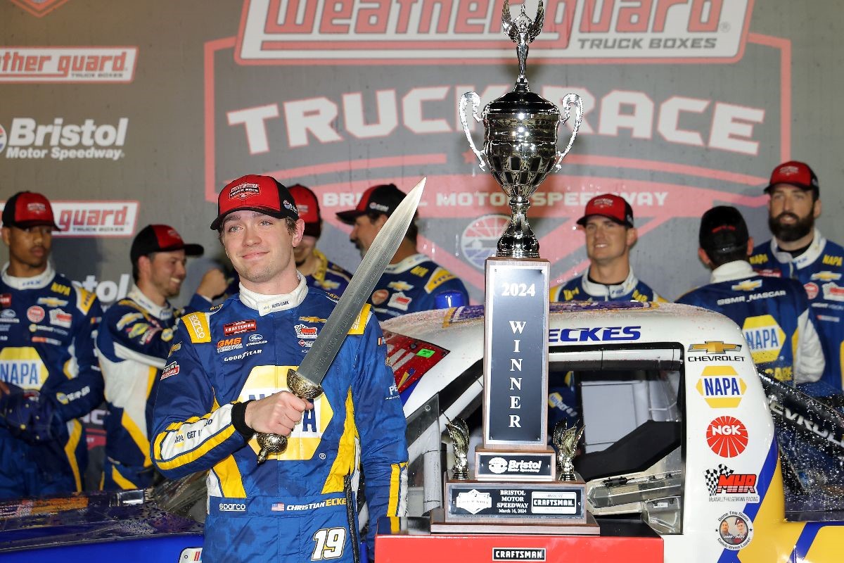 Christian Eckes shows off his hard ware in Bristol Motor Speedway's victory lane after winning the 250-lap WEATHER GUARD Truck Race Saturday night.