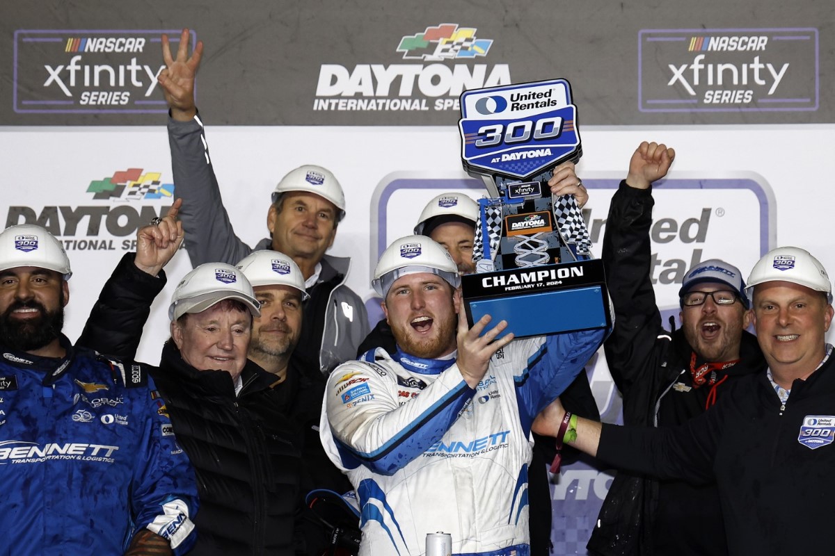 Austin Hill, driver of the #21 Bennett Transportation Chevrolet, celebrates in victory lane after winning the NASCAR Xfinity Series United Rentals 300 at Daytona International Speedway on February 19, 2024 in Daytona Beach, Florida. (Photo by Chris Graythen/Getty Images)