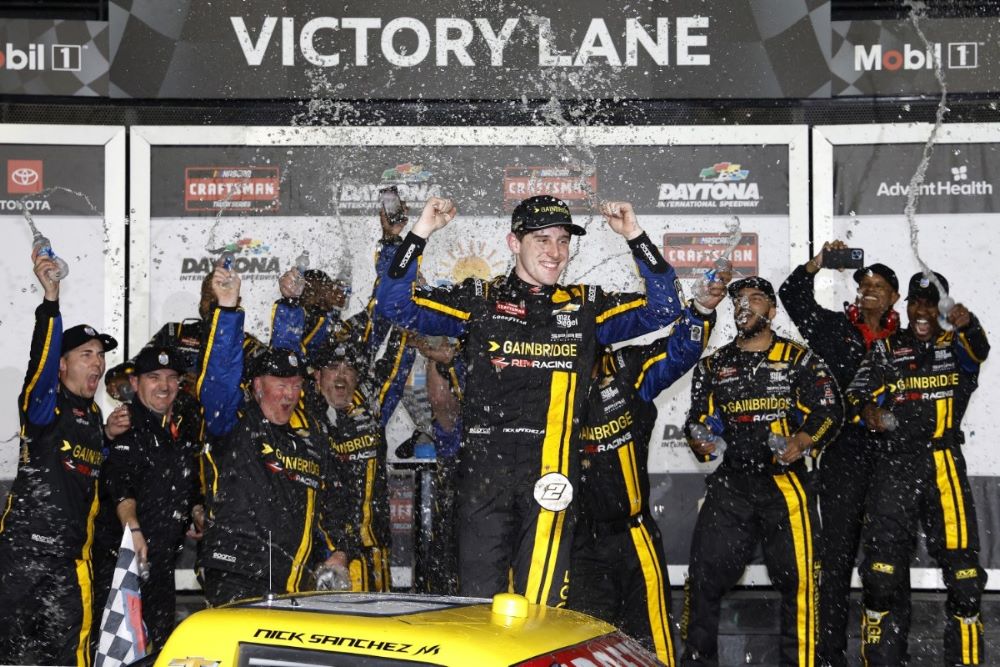 Nick Sanchez, driver of the #2 Gainbridge Chevrolet, celebrates in victory lane after winning the NASCAR Craftsman Truck Series Fresh from Florida 250 at Daytona International Speedway on February 16, 2024 in Daytona Beach, Florida. (Photo by Sean Gardner/Getty Images)