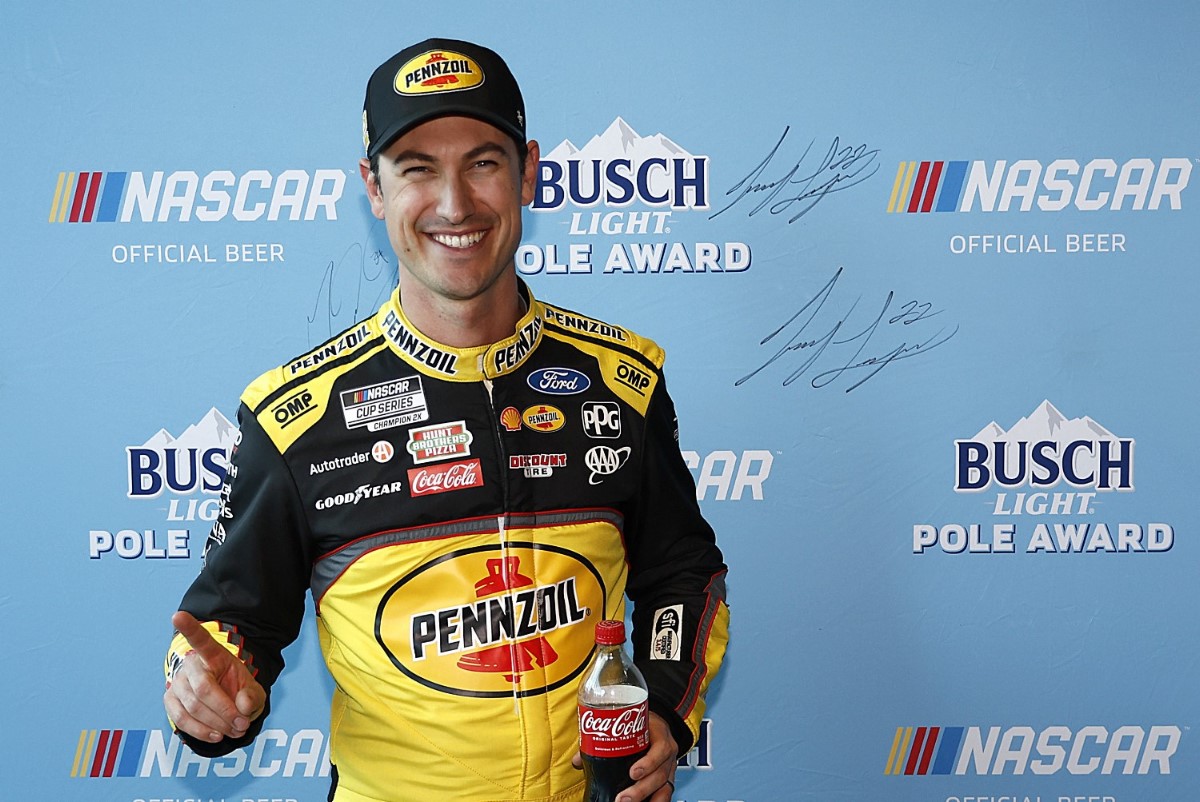 Joey Logano, driver of the #22 Pennzoil Ford, poses for photos after winning the pole award during qualifying for the NASCAR Cup Series Pennzoil 400 at Las Vegas Motor Speedway on March 02, 2024 in Las Vegas, Nevada. (Photo by Chris Graythen/Getty Images)