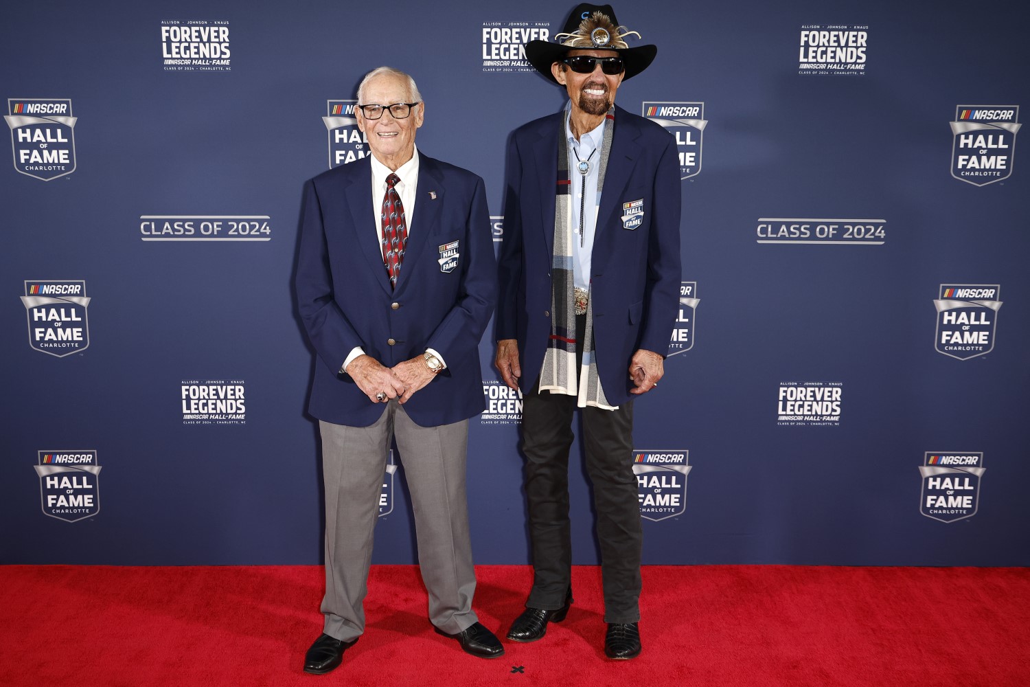 NASCAR Hall of Famers Dale Inman (L) and Richard Petty pose for photos on the red carpet prior to the 2024 NASCAR Hall of Fame Induction Ceremony at Charlotte Convention Center on January 19, 2024 in Charlotte, North Carolina. (Photo by Chris Graythen/Getty Images)
