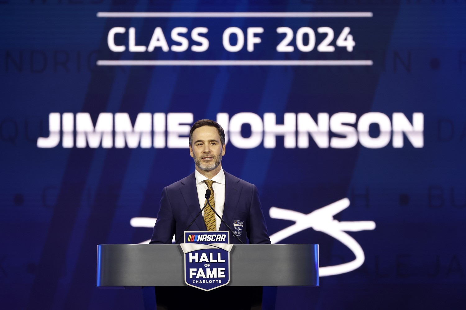 NASCAR Hall of Fame inductee Jimmie Johnson speaks during the 2024 NASCAR Hall of Fame Induction Ceremony at Charlotte Convention Center on January 19, 2024 in Charlotte, North Carolina. (Photo by Chris Graythen/Getty Images)