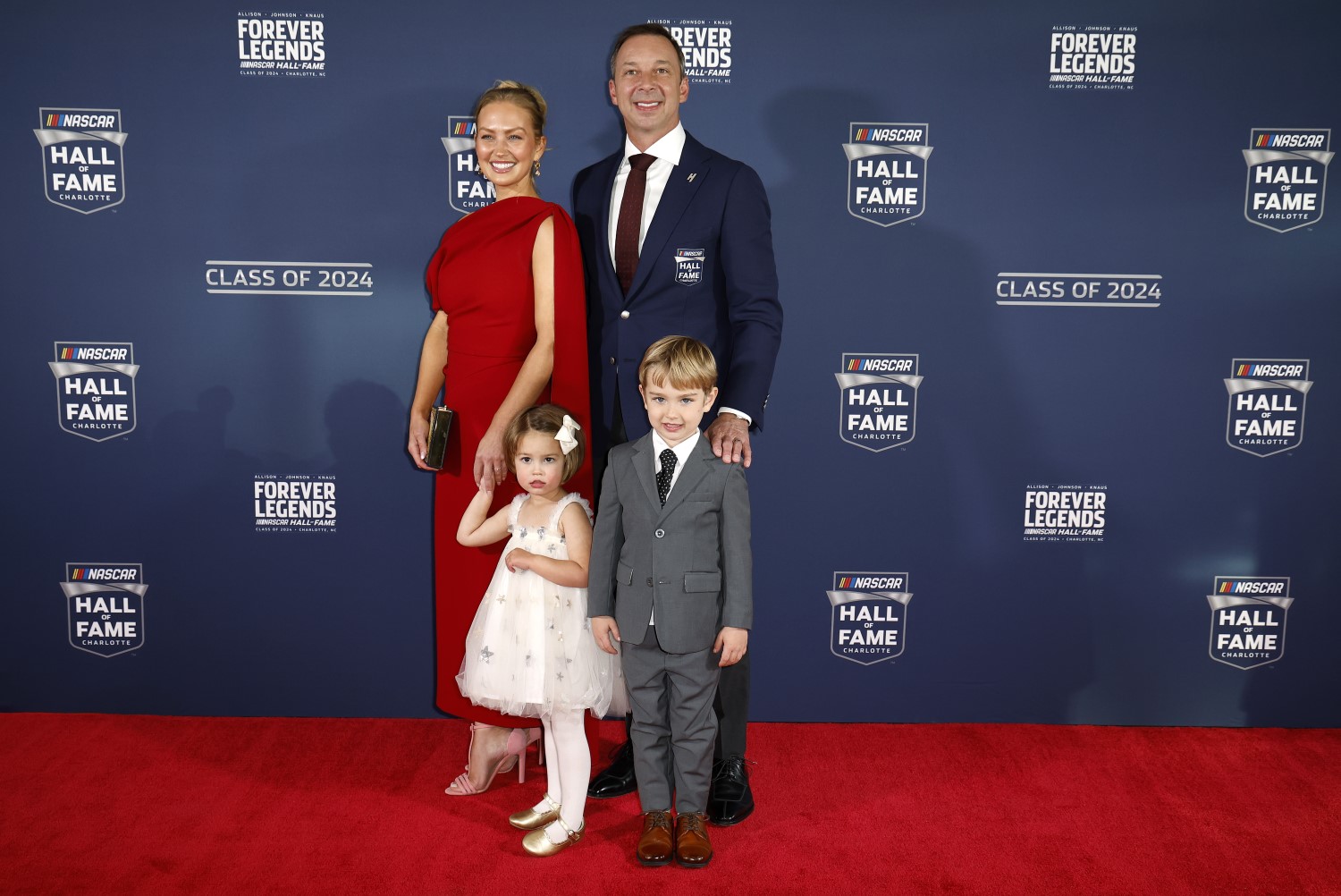 NASCAR Hall of Fame inductee Chad Knaus, son, Kipling Knaus, daughter, Vivienne Mae Knaus and wife, Brooke Knaus pose for photos on the red carpet prior to the 2024 NASCAR Hall of Fame Induction Ceremony at Charlotte Convention Center on January 19, 2024 in Charlotte, North Carolina. (Photo by Chris Graythen/Getty Images)