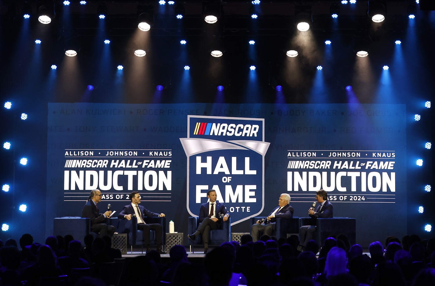 L-R) Host, Kyle Petty, NASCAR Hall of Fame inductees, Jimmie Johnson, and Chad Knaus and NASCAR Hall of Famers, Rick Hendrick and Jeff Gordon speak onstage during the 2024 NASCAR Hall of Fame Induction Ceremony at Charlotte Convention Center on January 19, 2024 in Charlotte, North Carolina. (Photo by Chris Graythen/Getty Images)