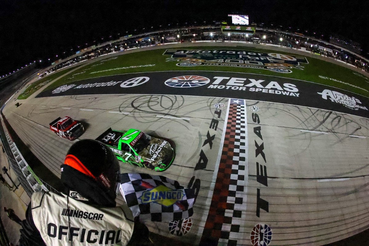 Kyle Busch, driver of the #7 Realtree Chevrolet, takes the checkered flag to win the NASCAR Craftsman Truck Series SpeedyCash.com 250 at Texas Motor Speedway on April 12, 2024 in Fort Worth, Texas. (Photo by Jonathan Bachman/Getty Images for NASCAR)