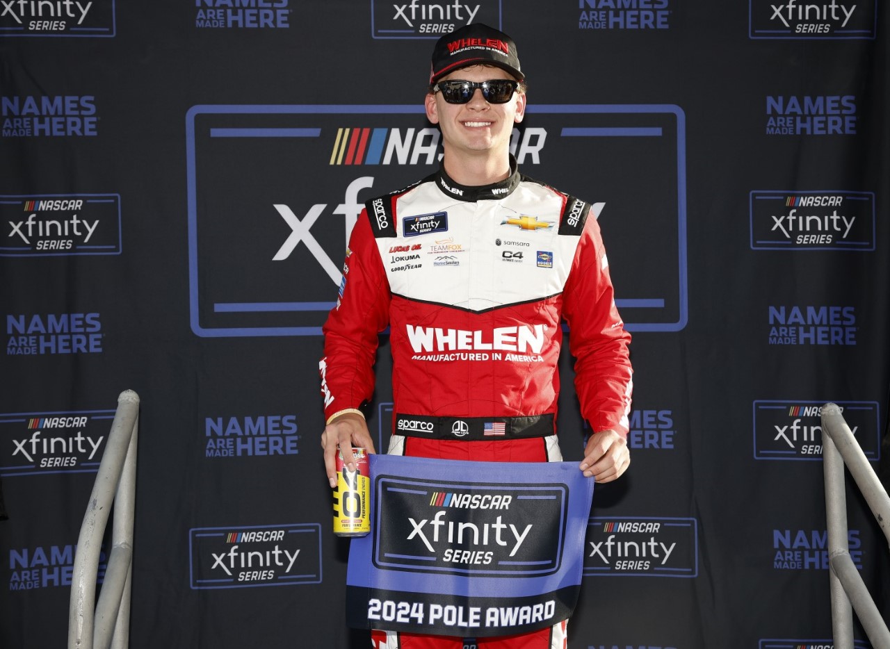 Jesse Love, driver of the #2 Whelen Chevrolet, poses for photos after winning the pole award during qualifying for the NASCAR Xfinity Series Andy's Frozen Custard 300 at Texas Motor Speedway on April 12, 2024 in Fort Worth, Texas. (Photo by Sean Gardner/Getty Images for NASCAR)