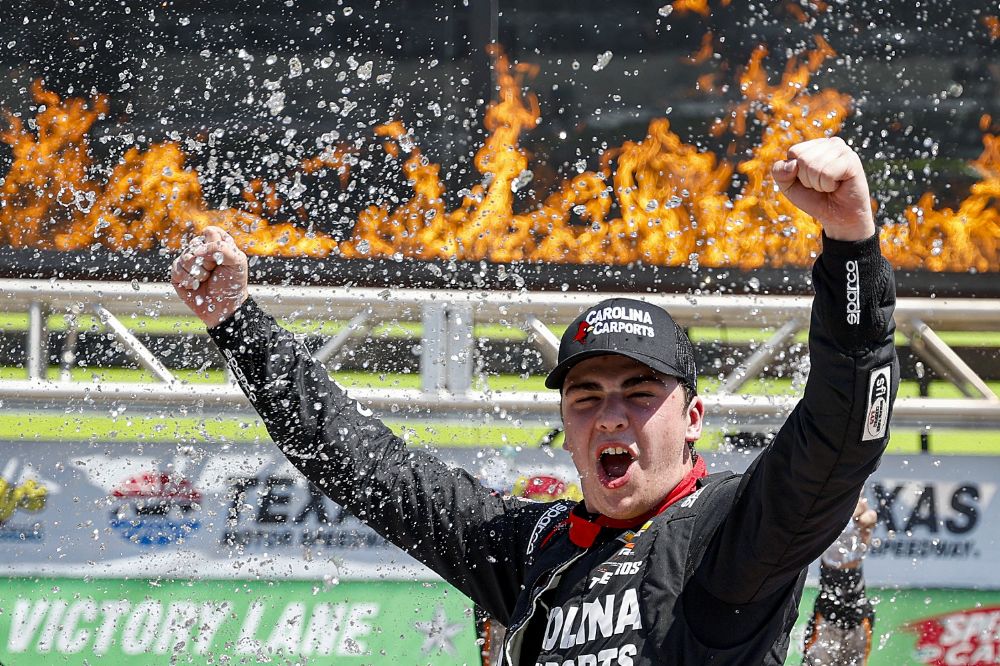 Sam Mayer, driver of the #1 Carolina Carports Chevrolet, celebrates in victory lane after winning the NASCAR Xfinity Series Andy's Frozen Custard 300 at Texas Motor Speedway on April 13, 2024 in Fort Worth, Texas. (Photo by Chris Graythen/Getty Images)