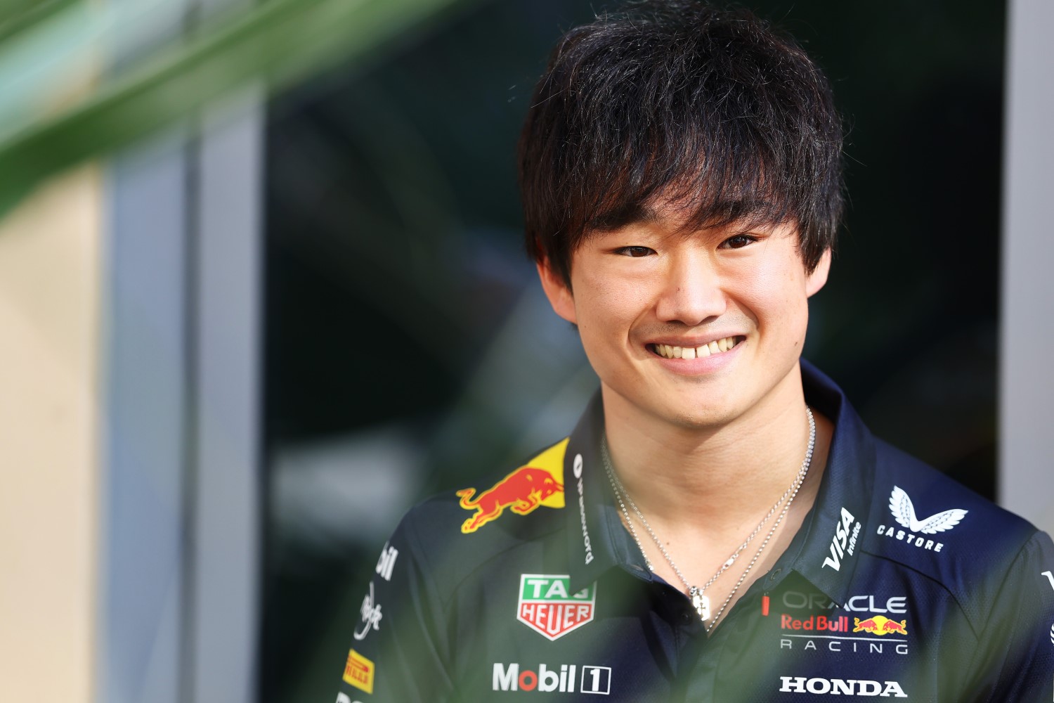 Yuki Tsunoda of Japan and Oracle Red Bull Racing looks on in the Paddock during previews ahead of the F1 Grand Prix of Abu Dhabi at Yas Marina Circuit on December 04, 2025 in Abu Dhabi, United Arab Emirates. (Photo by Mark Thompson/Getty Images) // Getty Images / Red Bull Content Pool //