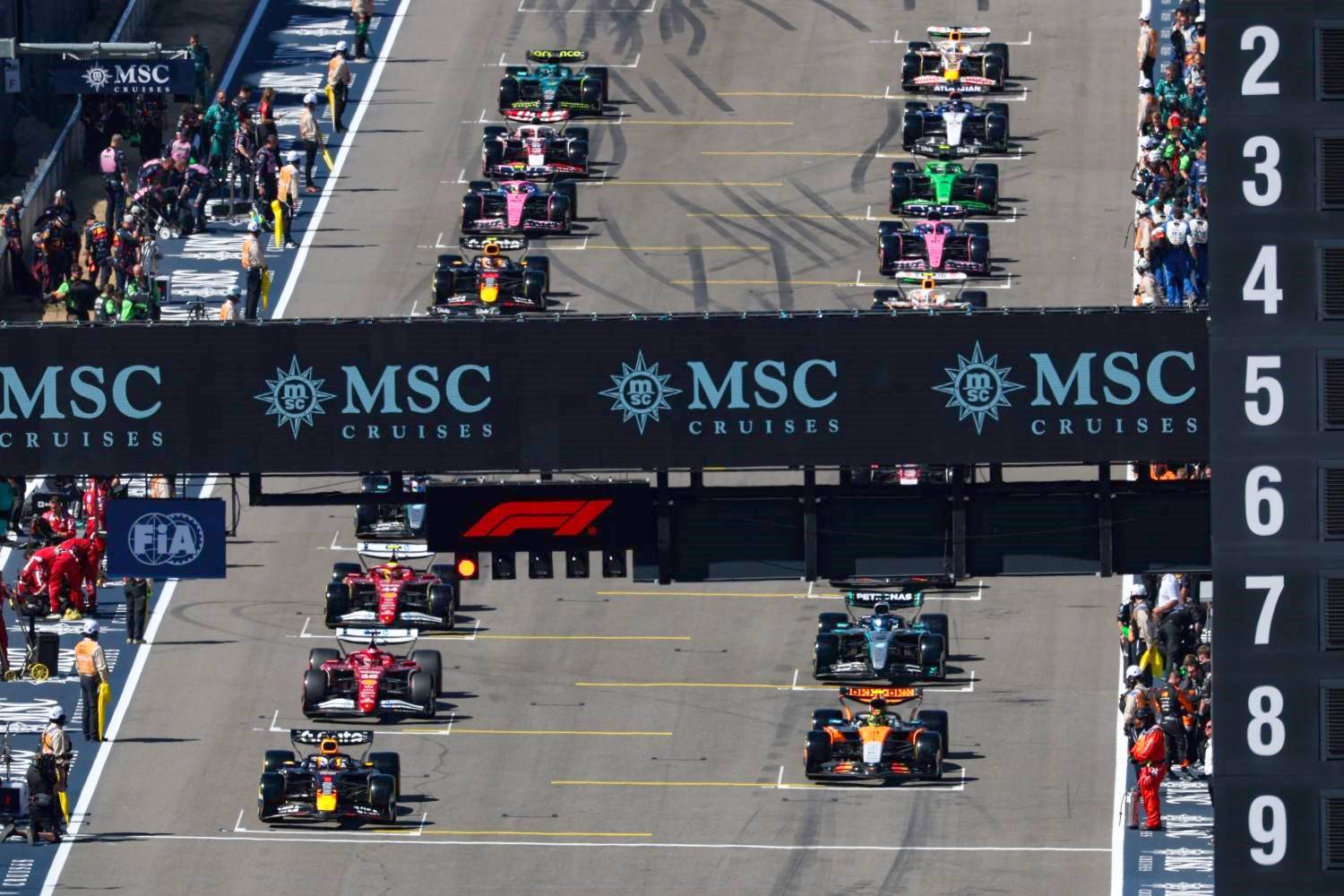 Max Verstappen of the Netherlands driving the (1) Oracle Red Bull Racing RB21 and Lando Norris of Great Britain driving the (4) McLaren MCL39 Mercedes lead the field away for the start of the formation lap prior to the F1 Grand Prix of United States at Circuit of The Americas on October 19, 2025 in Austin, Texas. (Photo by Sam Bloxham/LAT Images for McLaren)