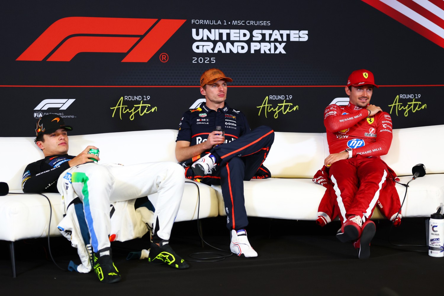 Race winner Max Verstappen of the Netherlands and Oracle Red Bull Racing Second placed Lando Norris of Great Britain and McLaren and Third placed Charles Leclerc of Monaco and Scuderia Ferrari in the Drivers Press Conference during the F1 Grand Prix of United States at Circuit of The Americas on October 19, 2025 in Austin, Texas. (Photo by Clive Rose/Getty Images) // Getty Images / Red Bull Content Pool //