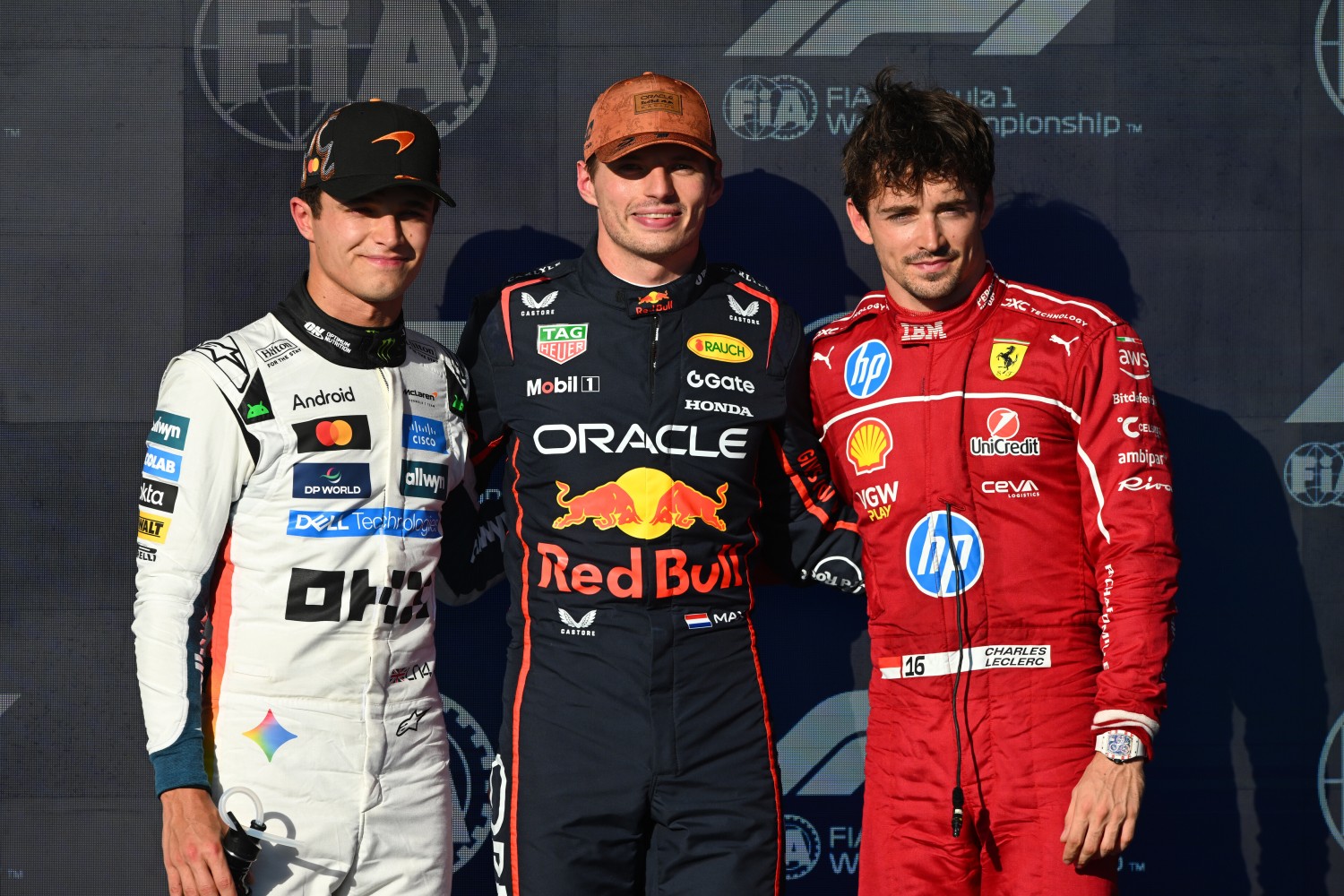 Pole position qualifier Max Verstappen of the Netherlands and Oracle Red Bull Racing Second placed qualifier Lando Norris of Great Britain and McLaren and Third placed qualifier Charles Leclerc of Monaco and Scuderia Ferrari look on during Qualifying ahead of the F1 Grand Prix of United States at Circuit of The Americas on October 18, 2025 in Austin, Texas. (Photo by Rudy Carezzevoli/Getty Images) // Getty Images / Red Bull Content Pool //