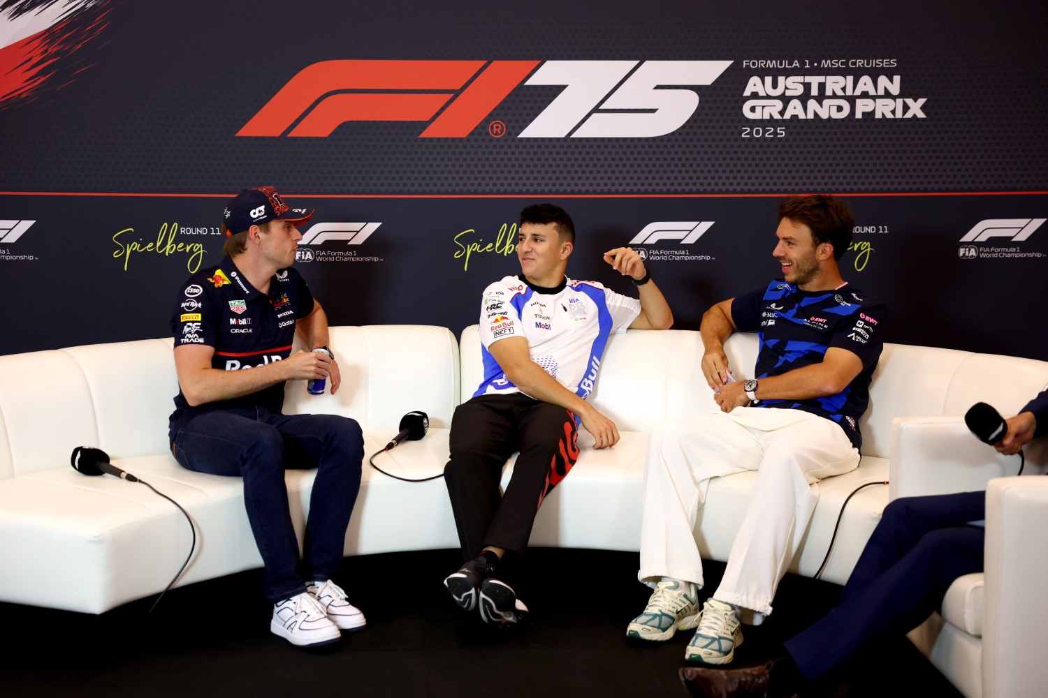 Max Verstappen of the Netherlands and Oracle Red Bull Racing Isack Hadjar of France and Visa Cash App Racing Bulls and Pierre Gasly of France and Alpine F1 in the Drivers Press Conference during previews ahead of the F1 Grand Prix of Austria at Red Bull Ring on June 26, 2025 in Spielberg, Austria. (Photo by Clive Rose/Getty Images) // Getty Images / Red Bull Content Pool //