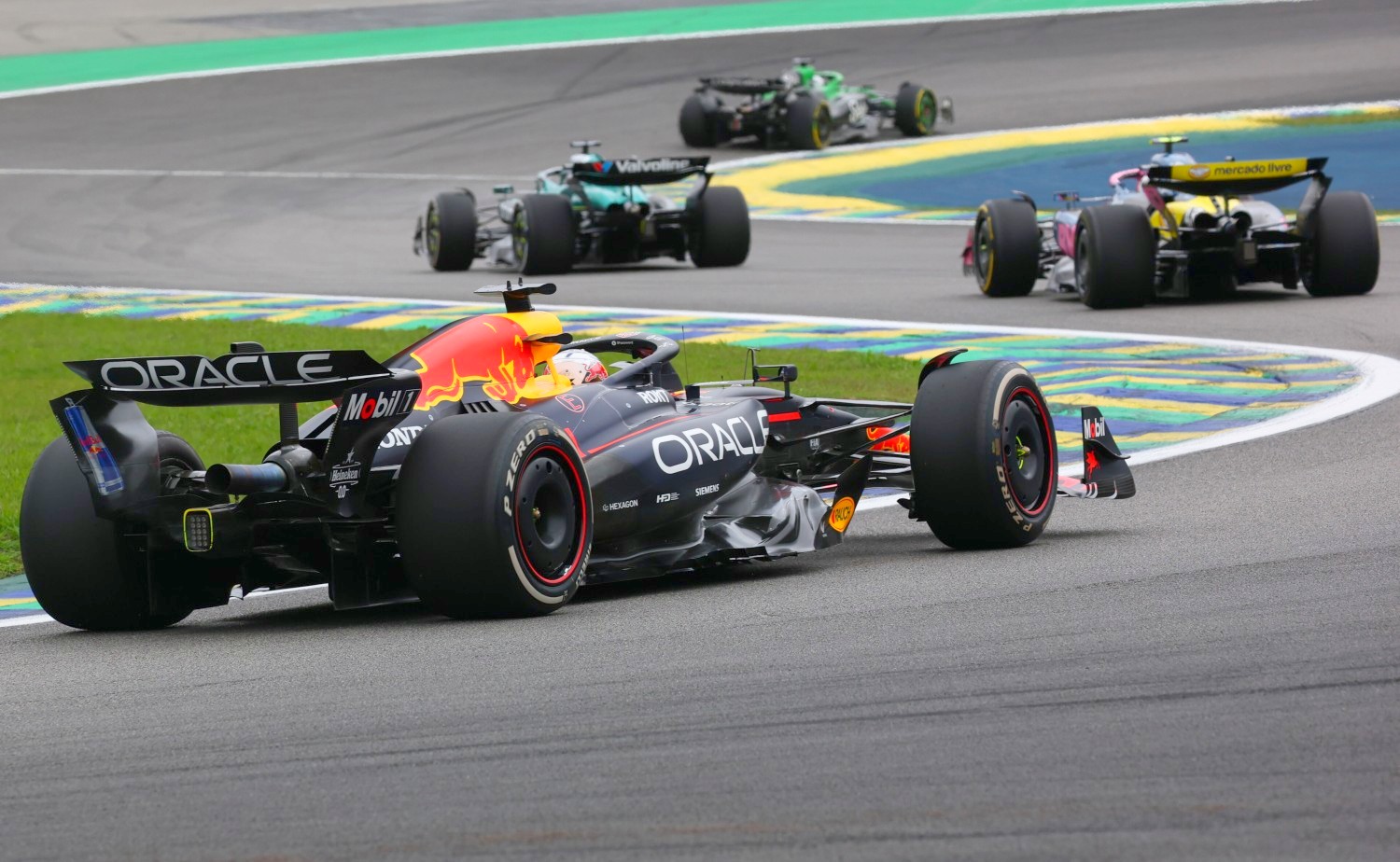 Nico Hulkenberg of Germany driving the (27) Kick Sauber C45 Ferrari leads. Lance Stroll of Canada driving the (18) Aston Martin F1 Team AMR25 MercedesFranco Colapinto of Argentina driving the (43) Alpine F1 A525 Renault and Max Verstappen of the Netherlands driving the (1) Oracle Red Bull Racing RB21 on track during the F1 Grand Prix of Brazil at Autodromo Jose Carlos Pace on November 09, 2025 in Sao Paulo, Brazil. (Photo by Mark Thompson/Getty Images) // Getty Images / Red Bull Content Pool //
