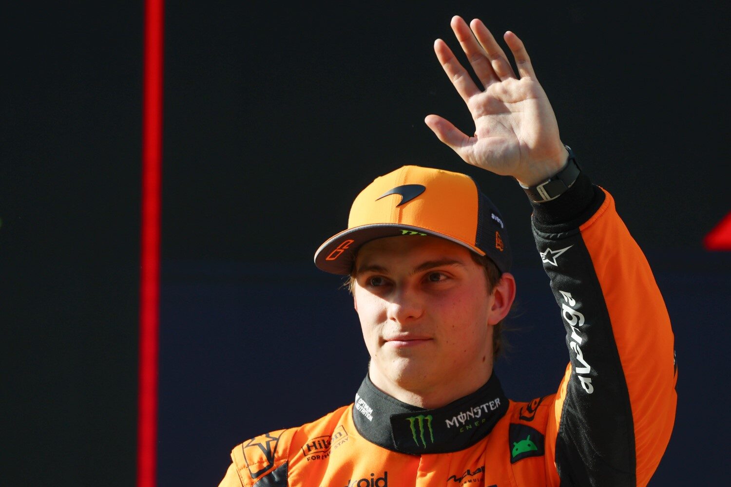 Pole position qualifier Oscar Piastri of Australia and McLaren waves in parc ferme during qualifying ahead of the F1 Grand Prix of China at Shanghai International Circuit on March 22, 2025 in Shanghai, China. (Photo by Sam Bloxham/LAT Images)