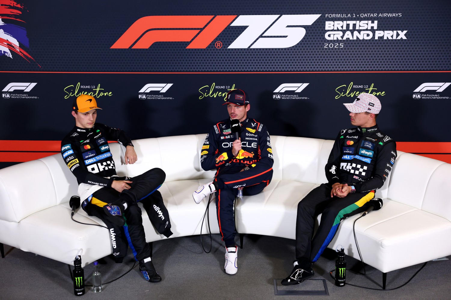Pole position qualifier Max Verstappen of the Netherlands and Oracle Red Bull Racing Second placed qualifier Oscar Piastri of Australia and McLaren and Third placed qualifier Lando Norris of Great Britain and McLaren in the Drivers Press Conference during qualifying ahead of the F1 British GP at Silverstone Circuit on July 05, 2025 in Northampton, England. (Photo by Clive Rose/Getty Images) // Getty Images / Red Bull Content Pool //
